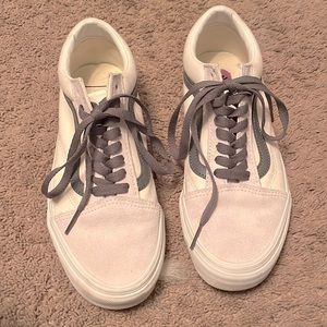 Grey and white low top vans